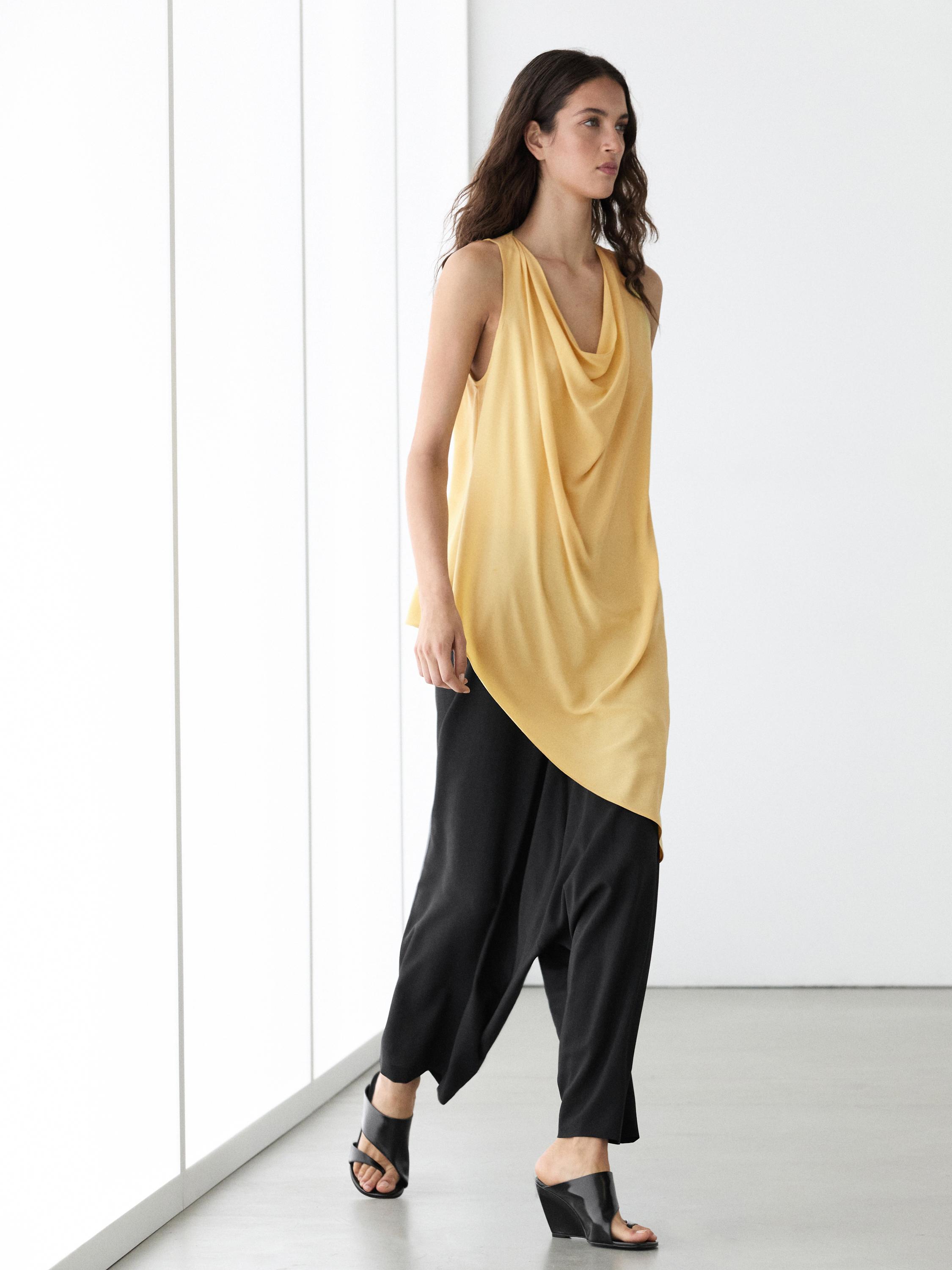 Long flowing asymmetric top